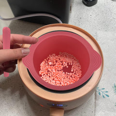 KVZVK silicone wax spatula for precise scooping and smooth application.