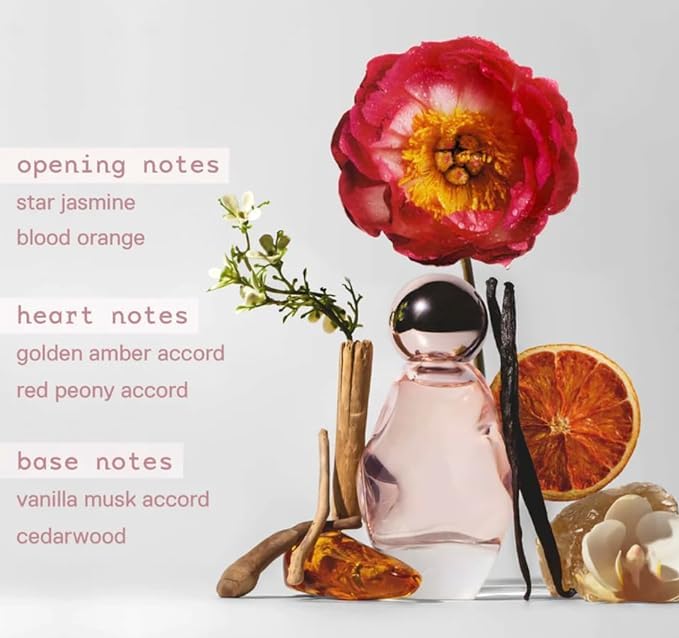 Kylie Cosmic bottle glass texture close-up hints warmth for evening fragrance.