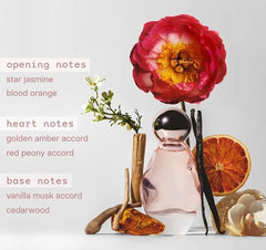 Kylie Cosmic bottle glass texture close-up hints warmth for evening fragrance.