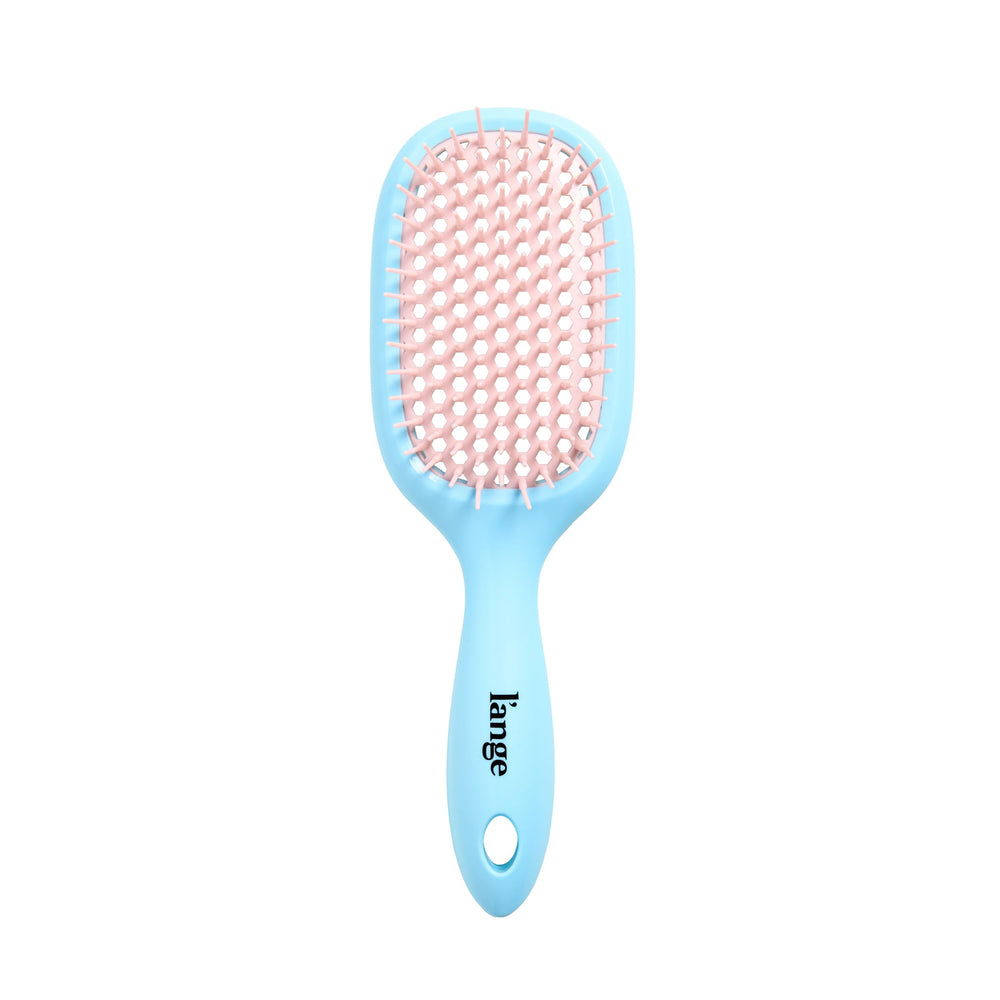 Durable materials support daily detangling on extensions and sensitive scalps.