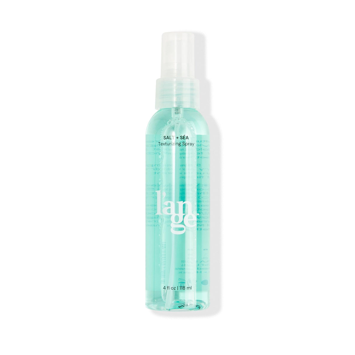 L'ANGE HAIR Spray texturizante de sal marina, botella, textura suave y movimiento natural.