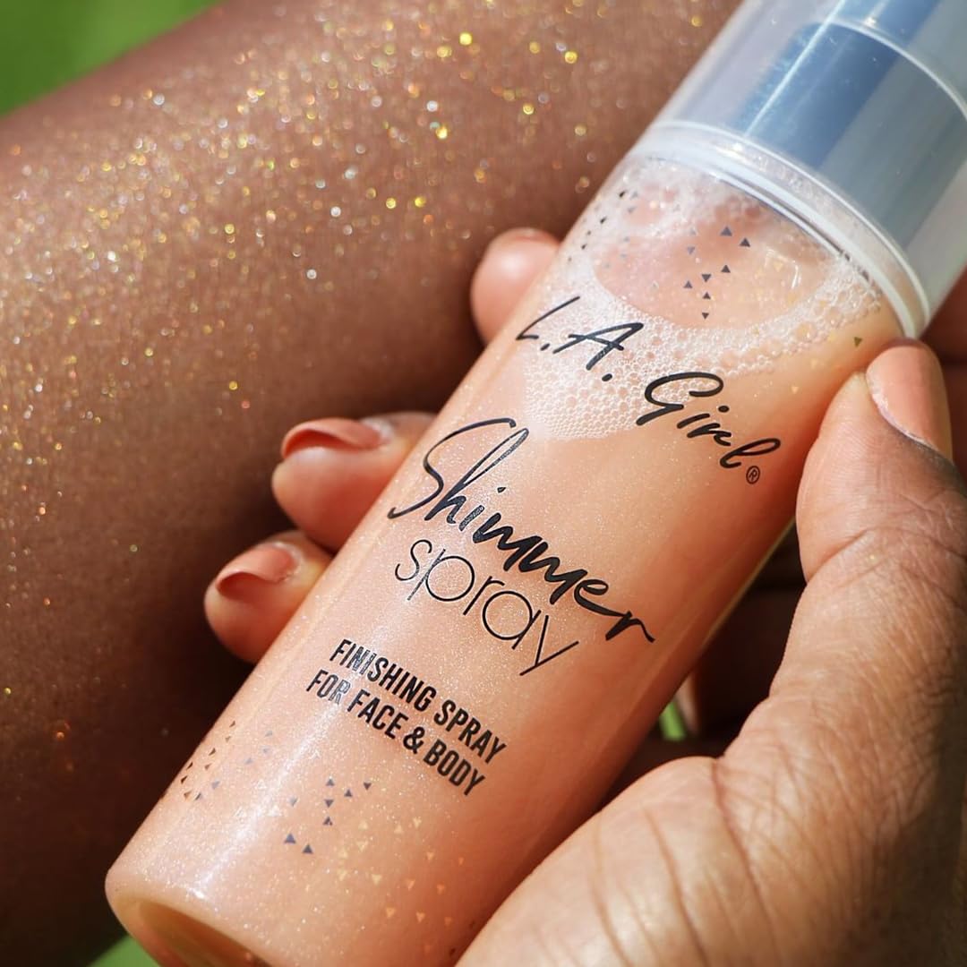 L.A. Girl Shimmer Spray Rose Gold in a vanity setup ready for touch-ups.