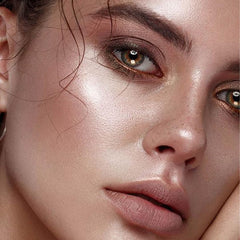 L.A. Girl Shimmer Spray Rose Gold swatch on skin showing rose gold shimmer.