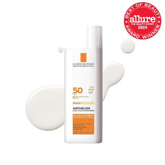 La Roche-Posay Anthelios mineral sunscreen texture close-up showing quick absorption.