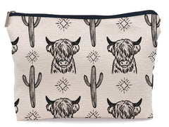 Lacosu Western Cow makeup bag front view shows a stylish western motif and durable exterior.