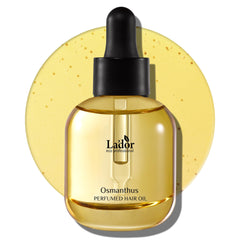 LA'DOR Aceite Perfume Cabello Osmanthus, botella elegante con brillo suave.