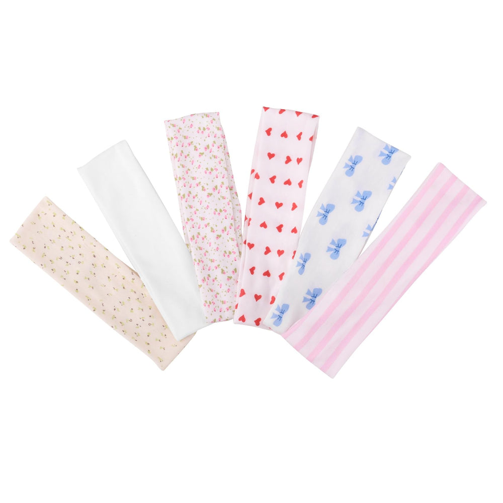 Lajou headbands with pink blossoms for cute, feminine flair.
