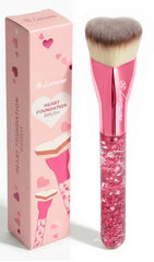 Lamora blending brush with heart-shaped kabuki for flawless foundation application.