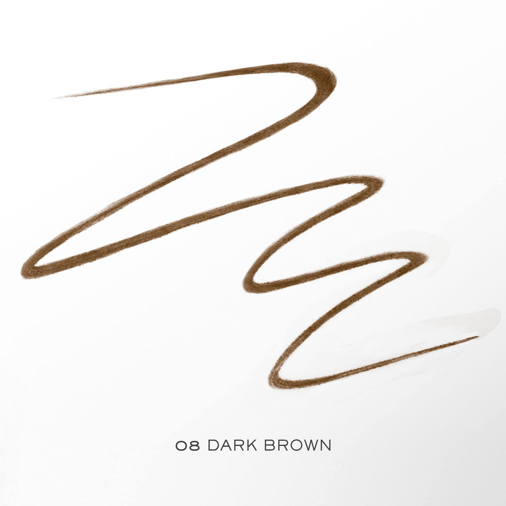 Lancôme Brow Shaping Pencil spoolie end grooming brows for even blend.