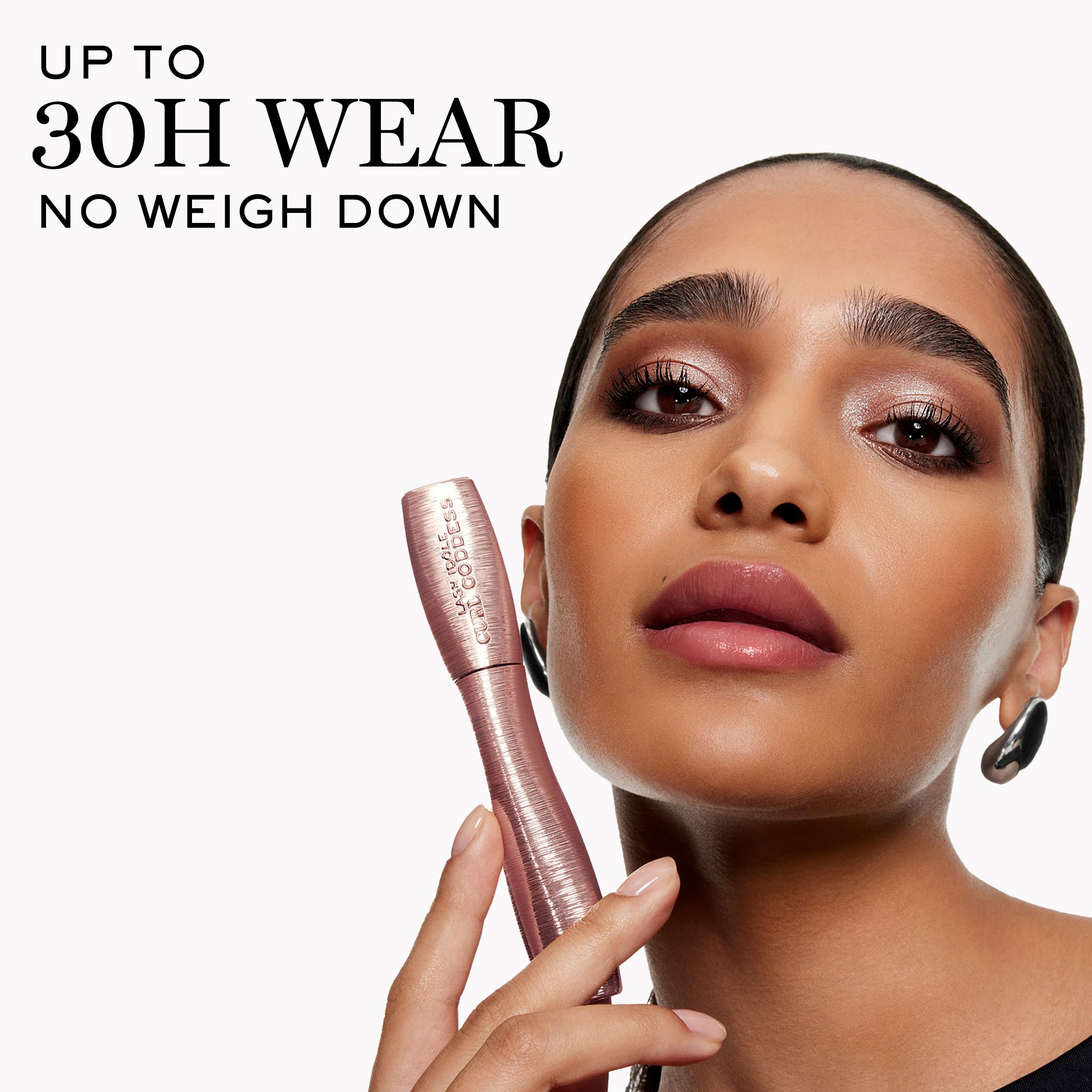 Lancôme Curl Goddess Mascara clump- and flake-resistant formula on clean lashes.