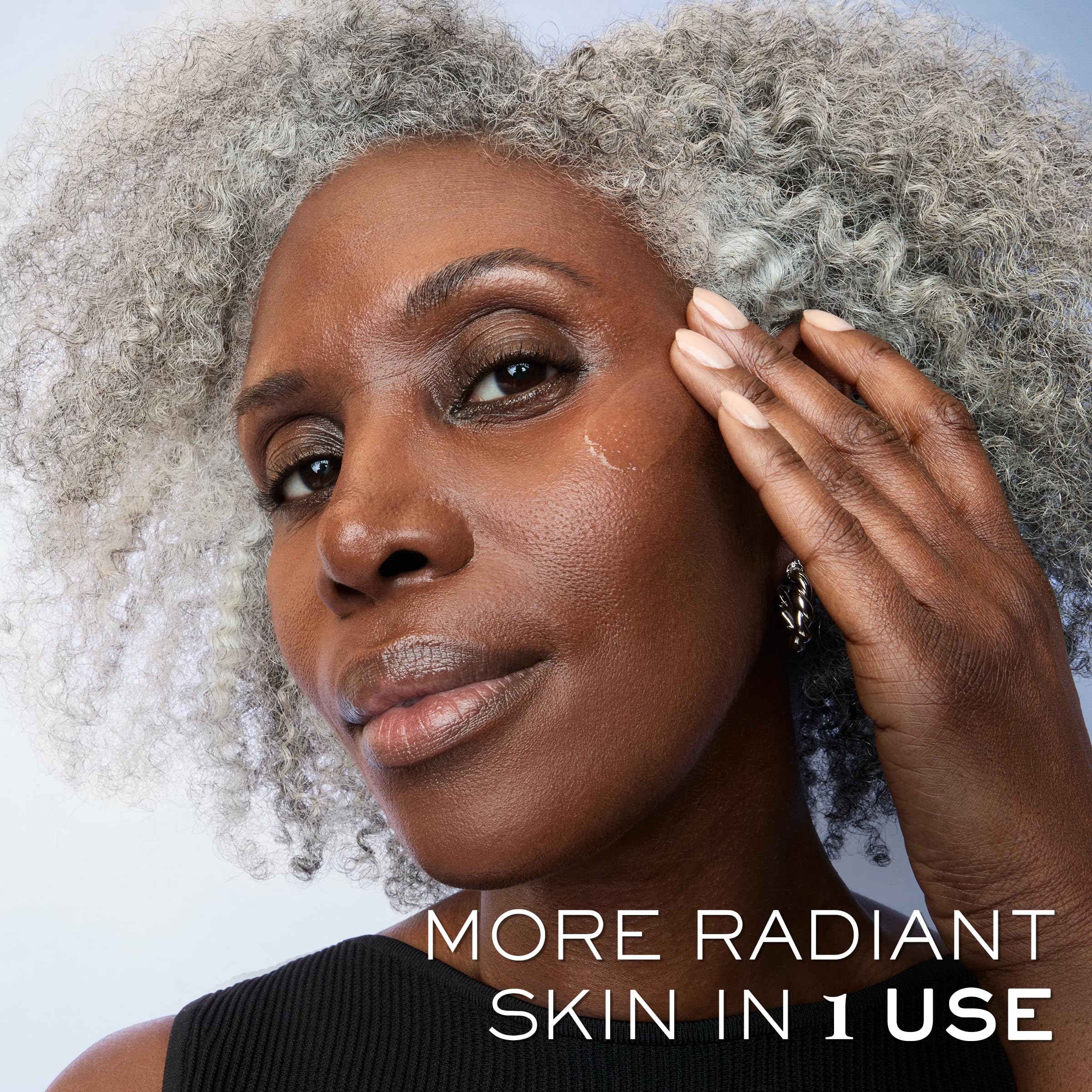 Lancôme Génifique Ultimate Recovery Serum glow hint suggesting radiant skin over time.