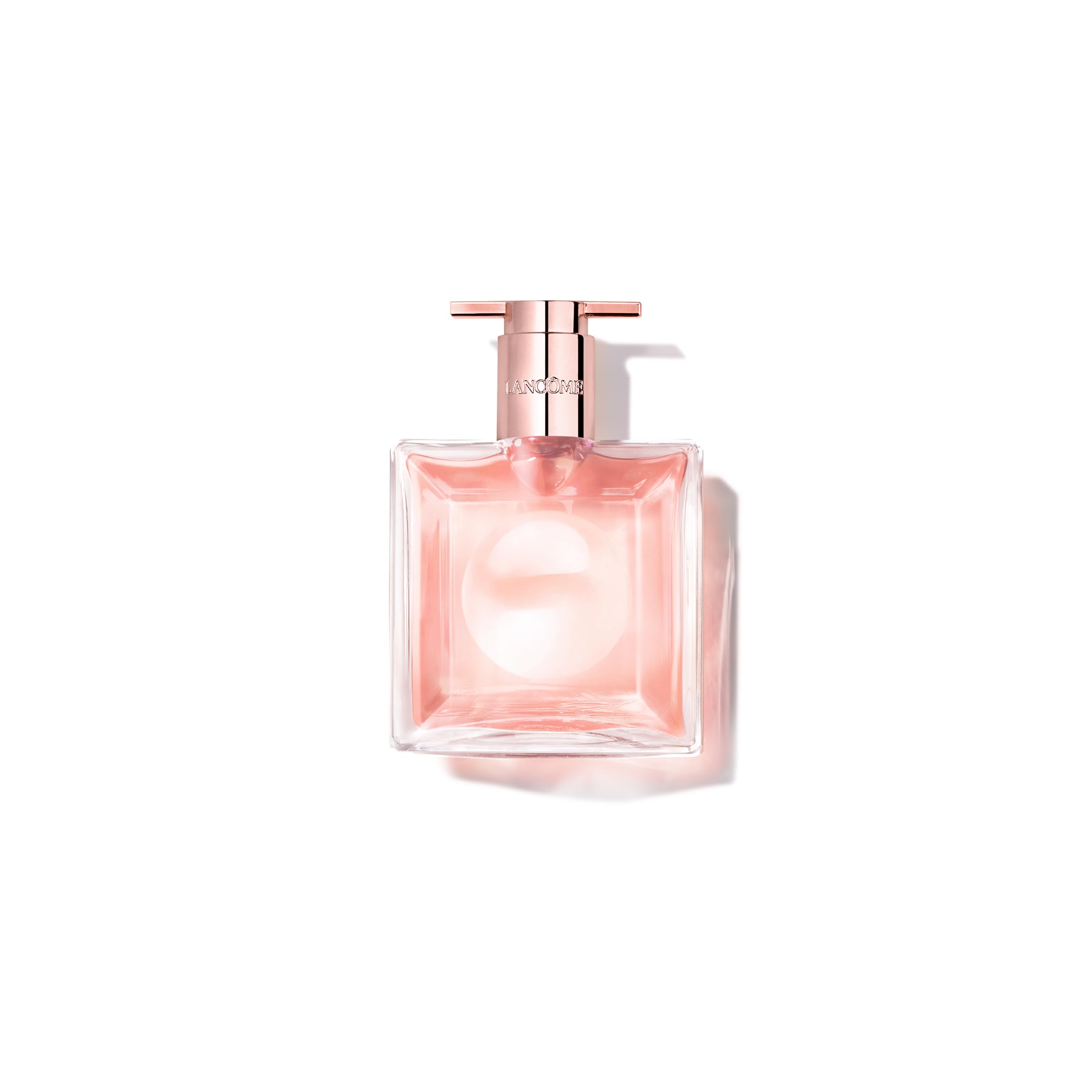 Lancôme Idôle bottle pour shows sleek, minimalist design for daily elegance.