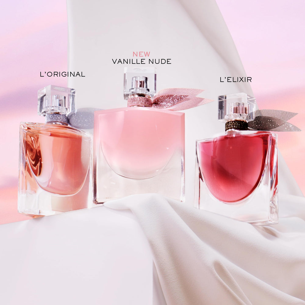 Lancôme La Vie Est Belle Vanille Nude in hand shows compact travel size.