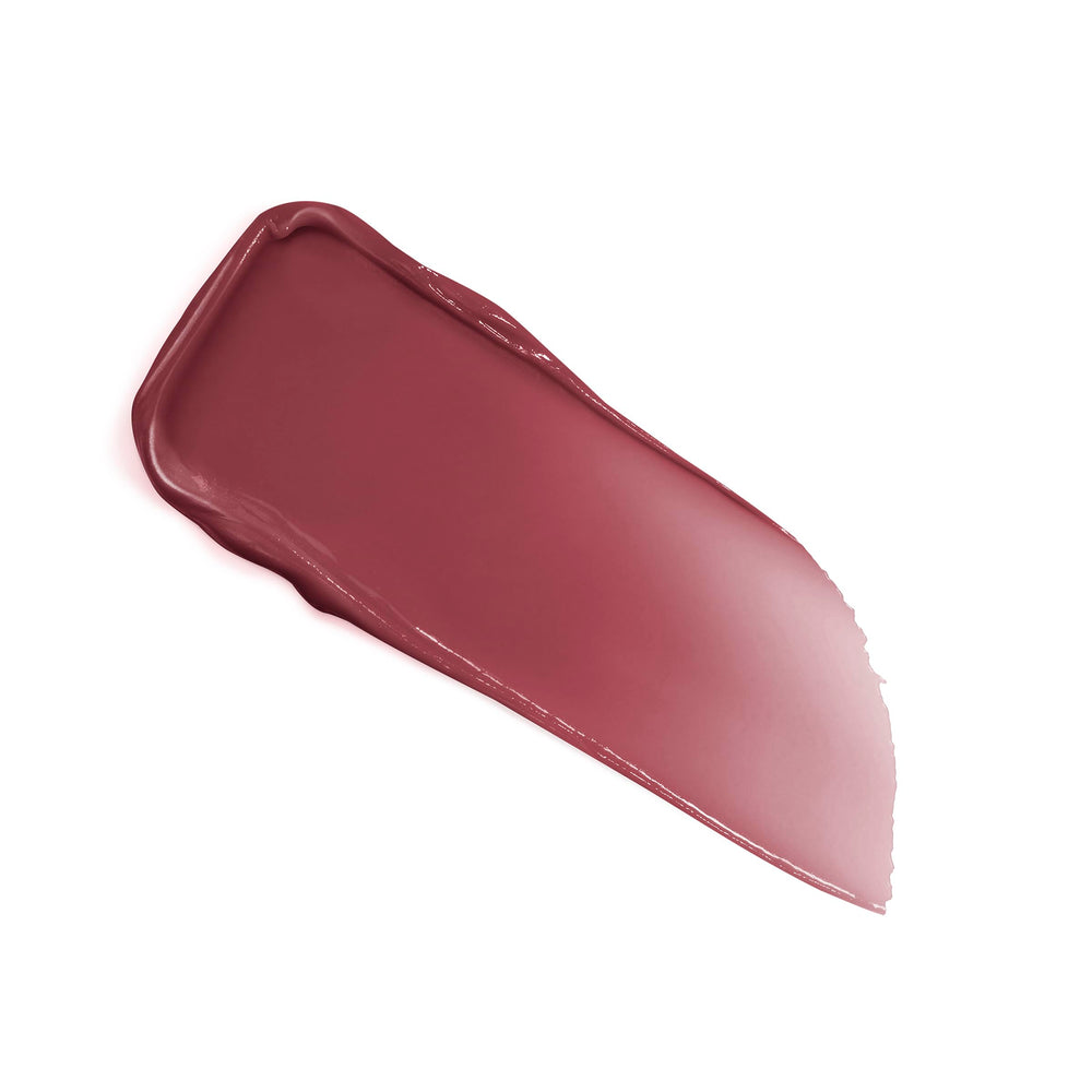 Lancôme Lip Idôle Butterglow being swiped on lips for smooth comfort.