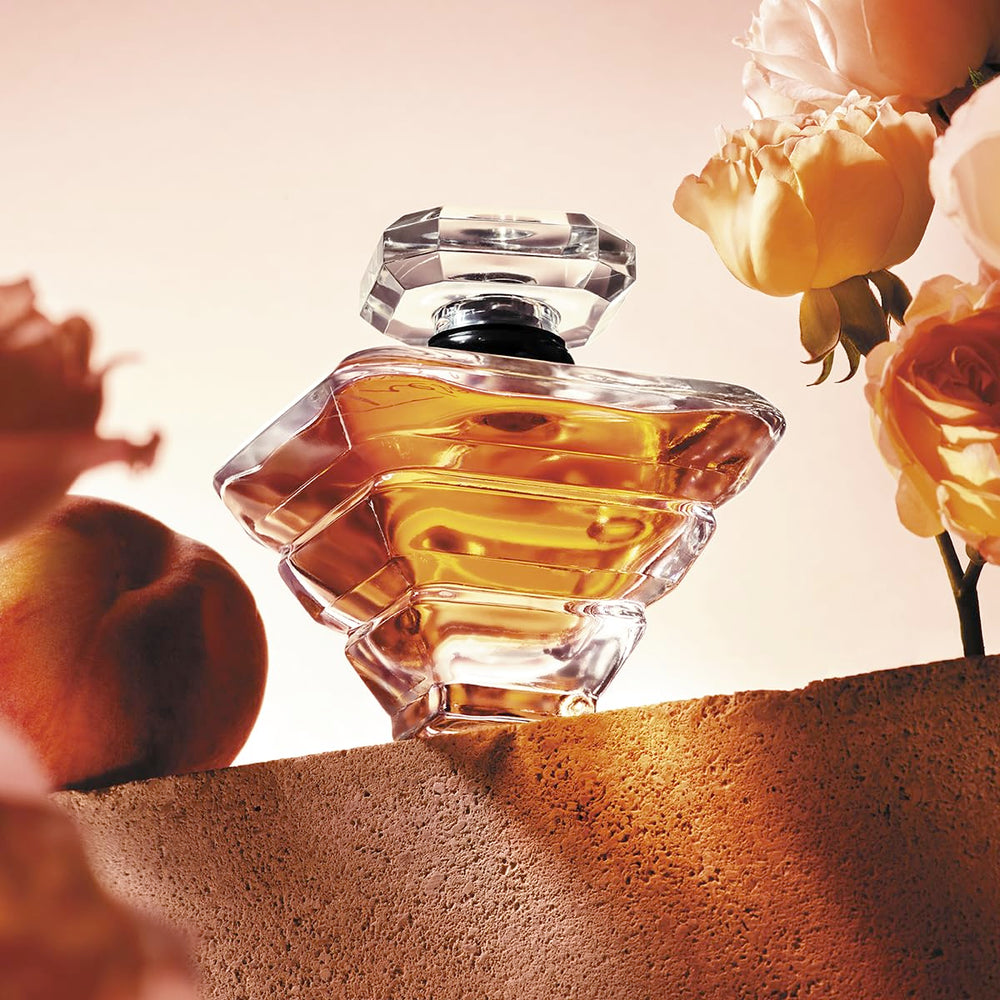 Lancôme Trésor diamond-shaped cap underlines luxury in every shelf.