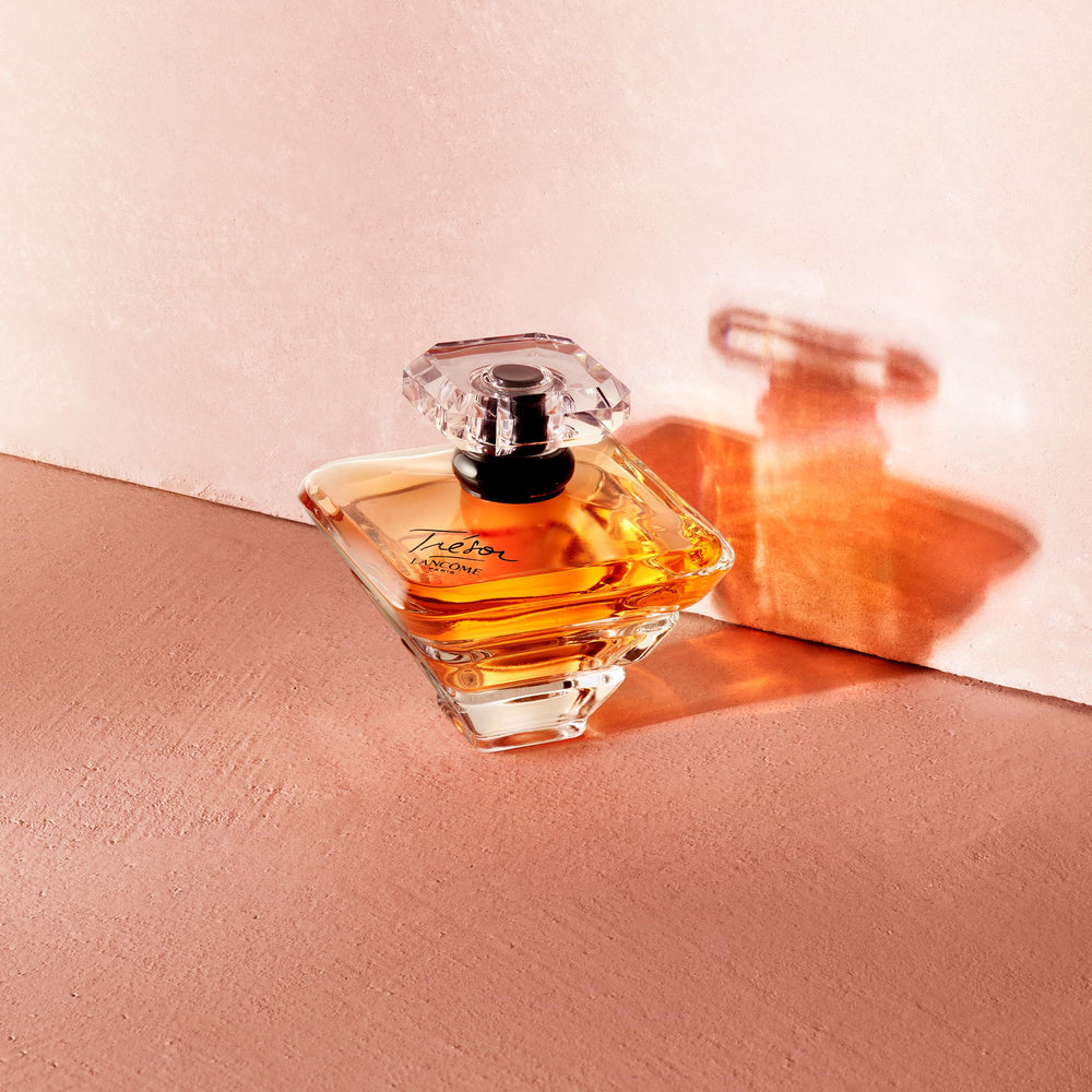 Lancôme Trésor golden juice glows inside the crystal bottle.