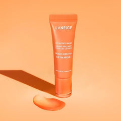 LANEIGE Lip Glowy Balm close-up highlighting glossy finish on lips.