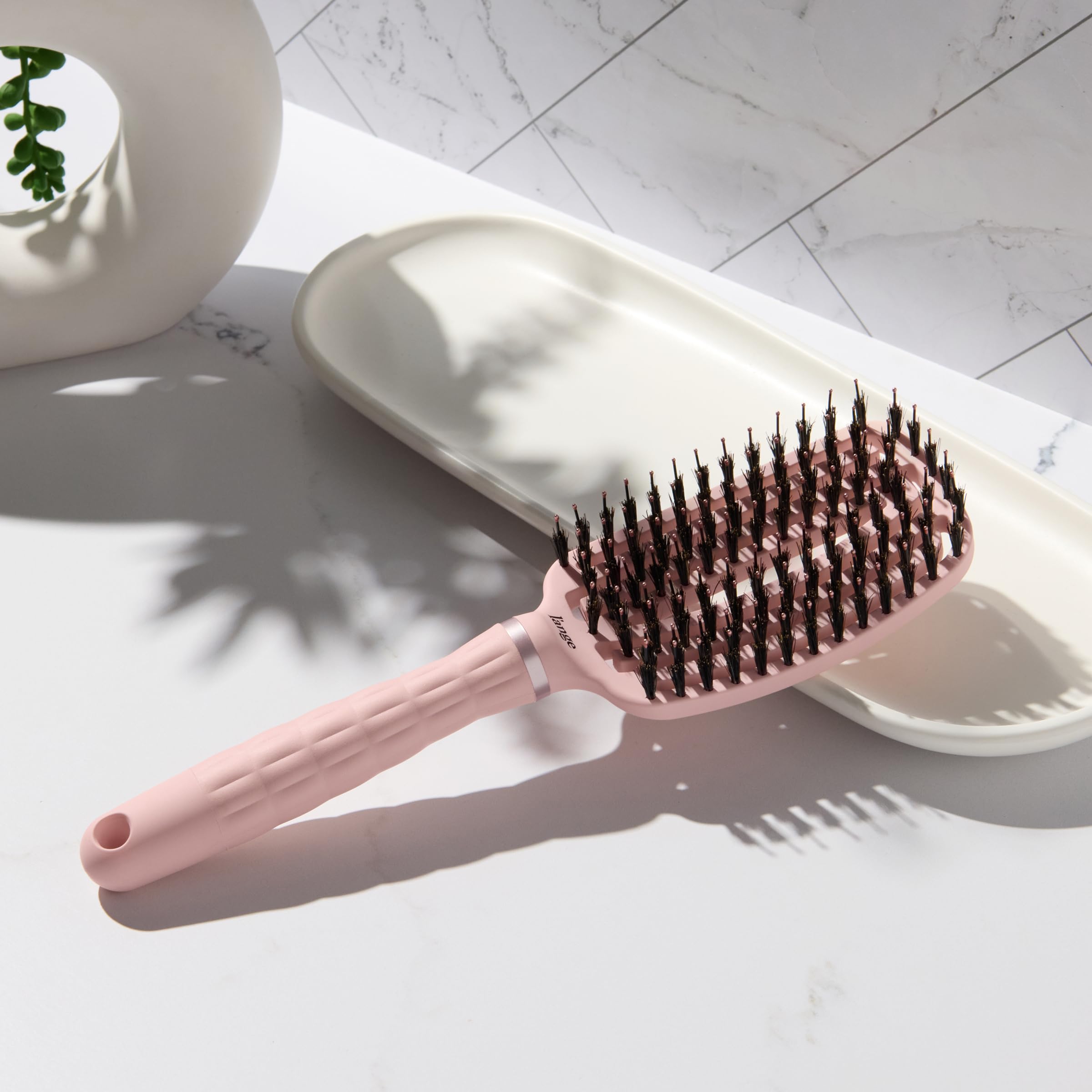 L'ANGE HAIR vented design speeds styling and reduces heat exposure.