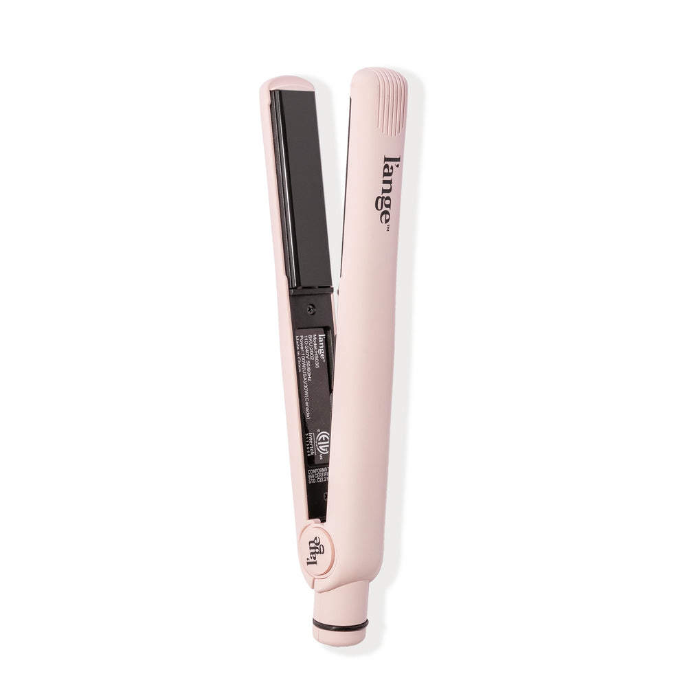 L'ANGE HAIR Aplatir with blush handle for sleek, frizz-free results.