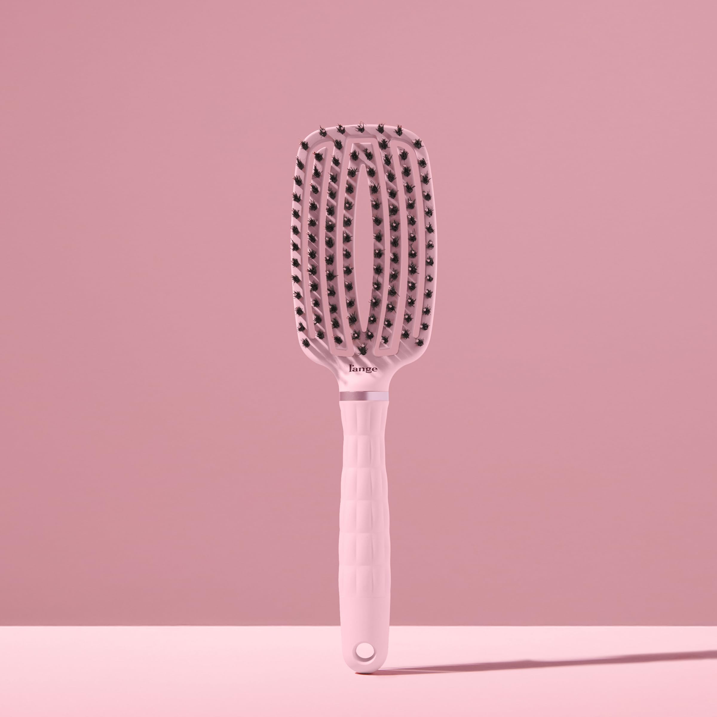 L'ANGE HAIR comfort-grip brush for daily detangling and easy handling.
