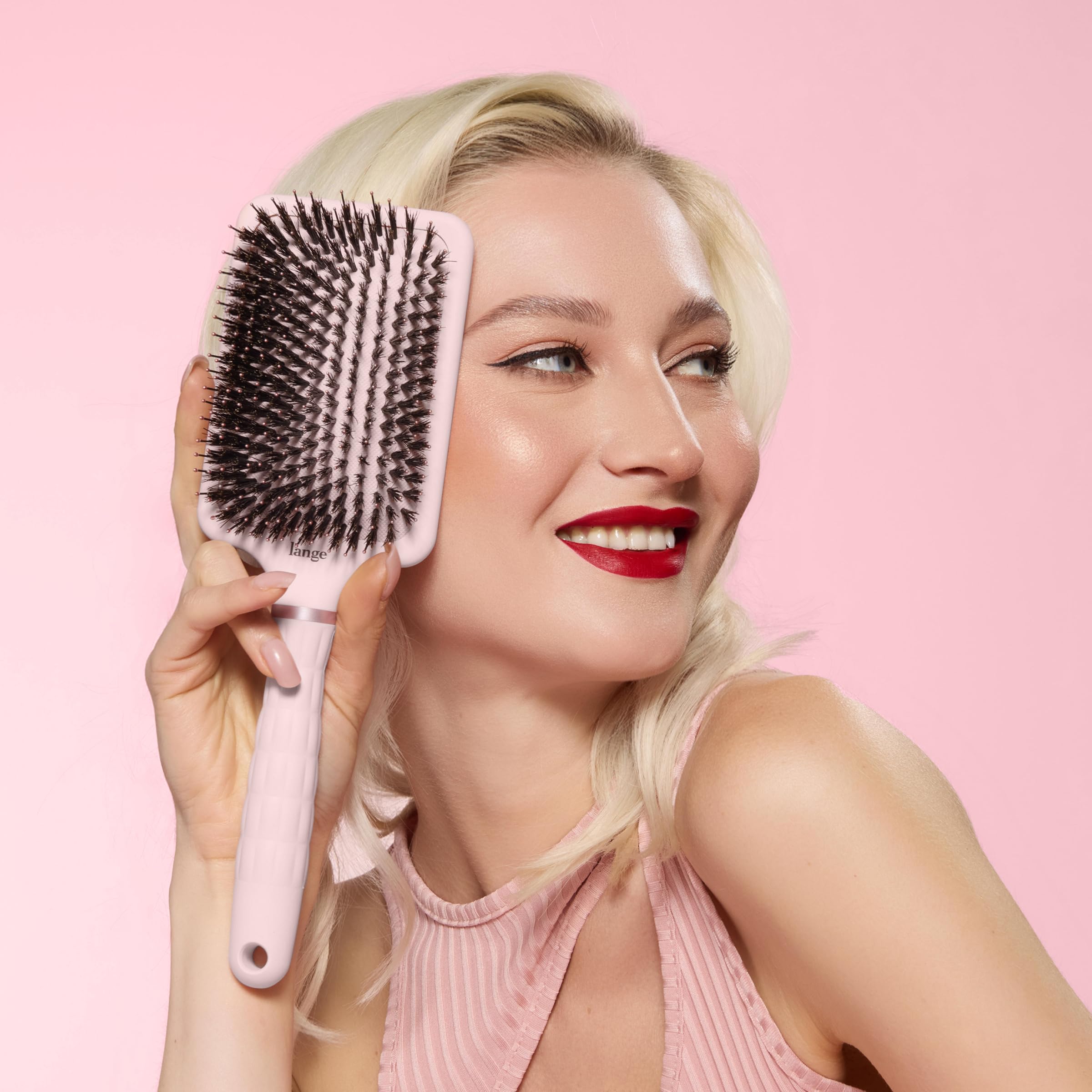 L'ANGE HAIR Detangling Paddle Brush fights frizz and distributes oils for a glossy finish