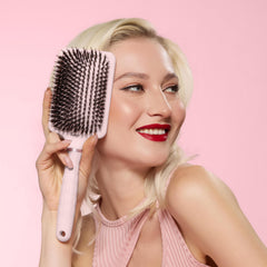 L'ANGE HAIR Detangling Paddle Brush fights frizz and distributes oils for a glossy finish