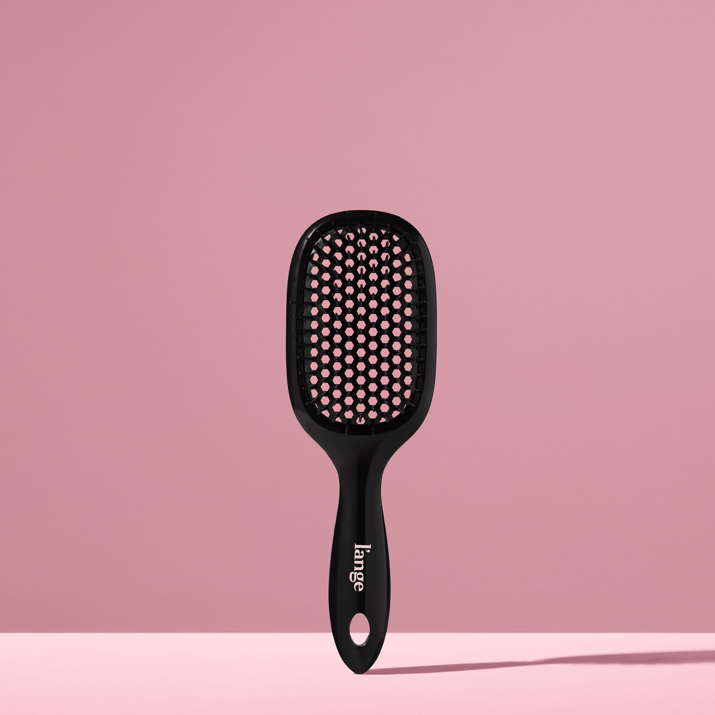 L'ANGE HAIR Detangling Vented Brush evenly distributes conditioner for smooth results