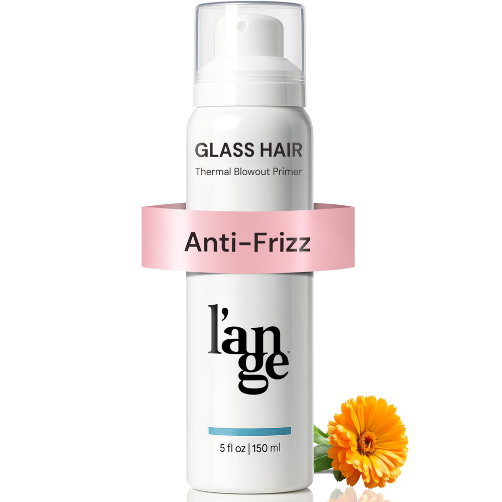 L'ANGE HAIR heat protection spray bottle close-up, highlighting protection and gloss.