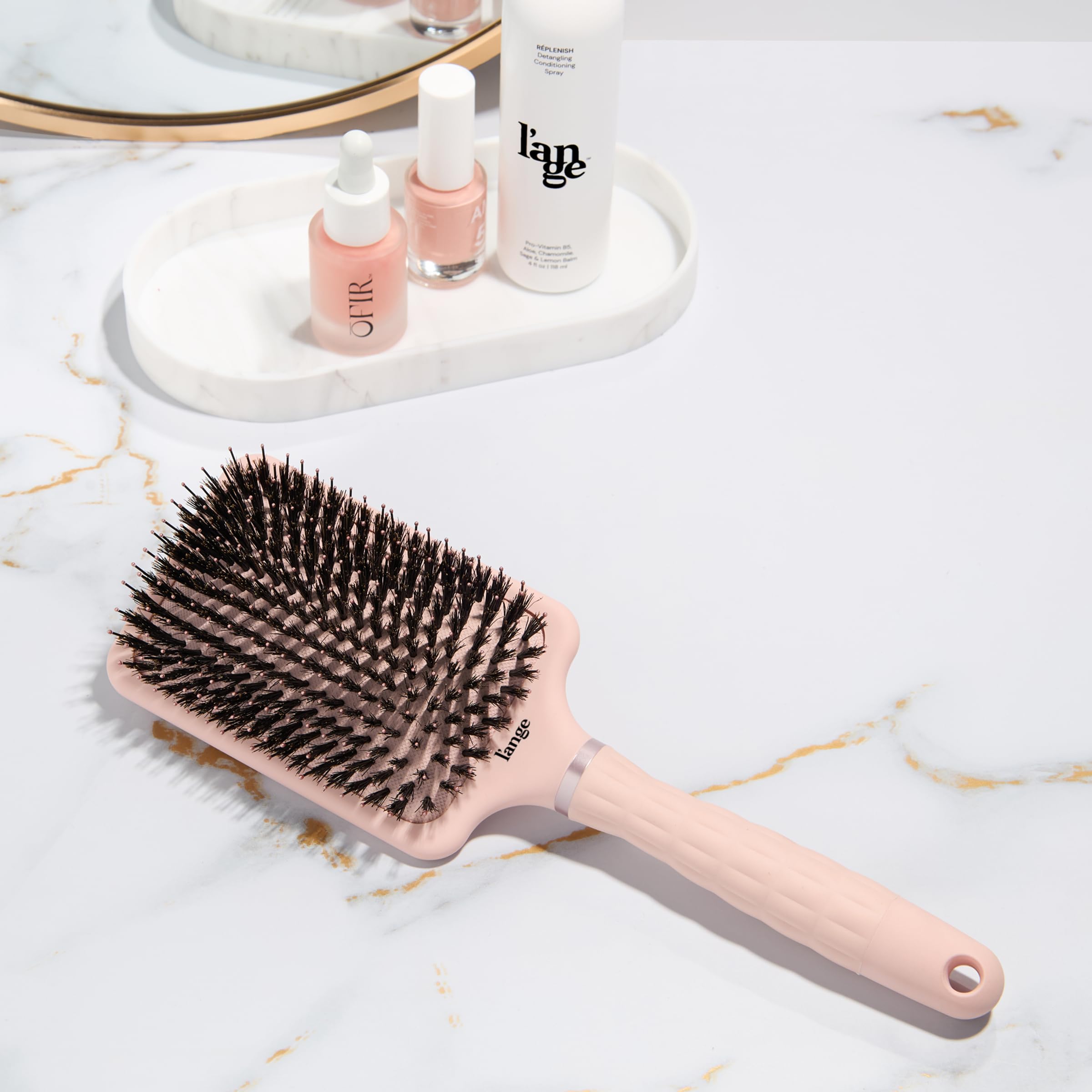L'ANGE HAIR Paddle Brush features a wide base for comfortable scalp contact during styling