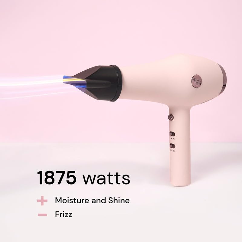 L'ANGE HAIR Soleil dryer with cool shot button for locking style.