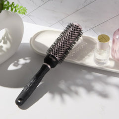 L'ANGE VolumePro vented ionic barrel reduces frizz for shiny, smooth results.