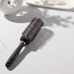 L'ANGE HAIR VolumePro frizz-reduction ionic barrel reduces frizz during styling