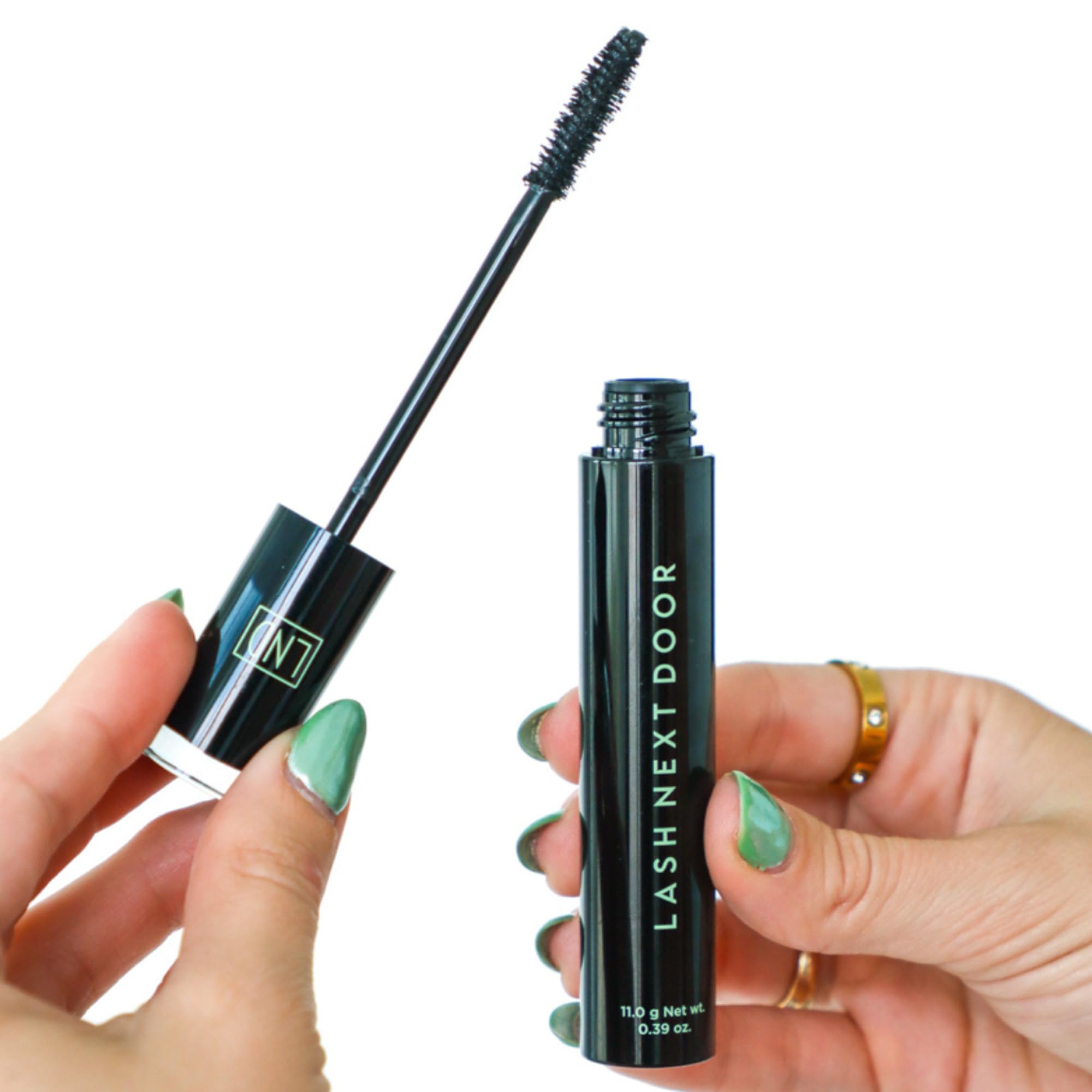 Lash Next Door Water Resistant Mascara lashes before coating for natural definition.