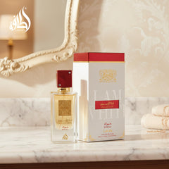 Lattafa Ana Abiyedh Rouge gift ready bottle with luxurious packaging for special celebrations