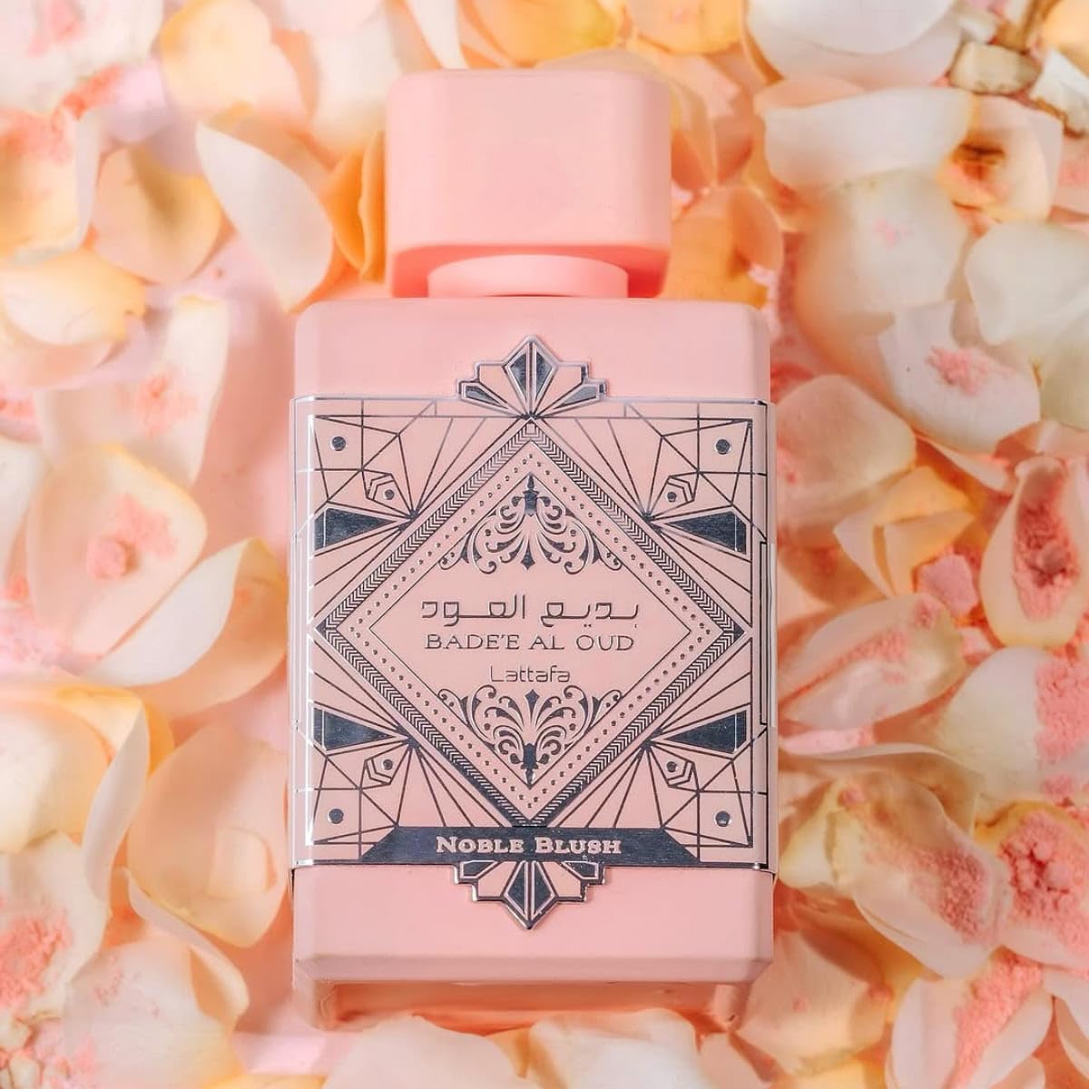 Note-focused close-up hints at Lattafa Bade'e Al Oud oud and patchouli richness.
