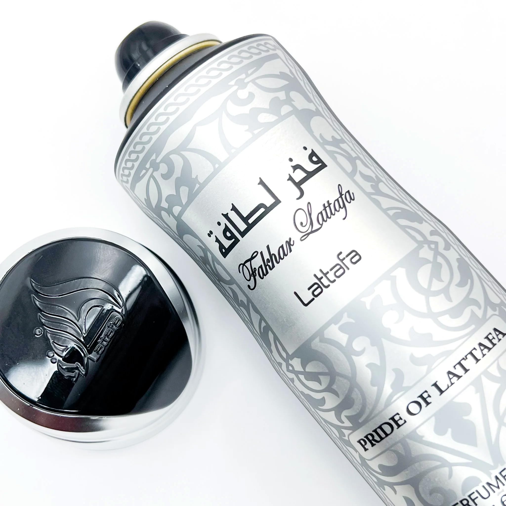 Lattafa Fakhar Men oak-moss base image evokes earthy strength and lasting depth.