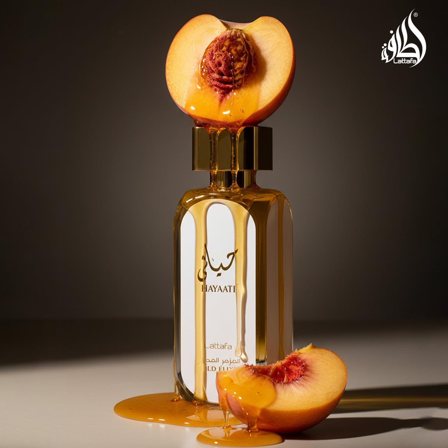 Lattafa Hayaati Gold Elixir citrus top-notes close-up, bright opening