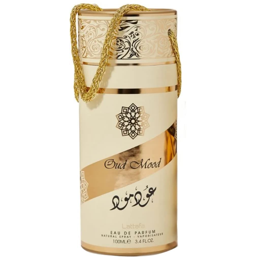 Lattafa Oud Mood cap and atomizer, easy spray and travel-friendly.