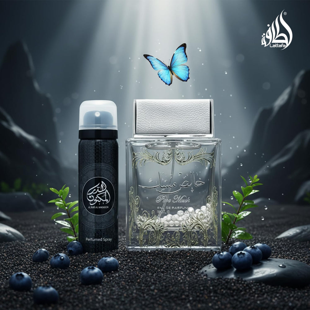 Lattafa Pure Musk glass bottle on desk, daily wear ready.