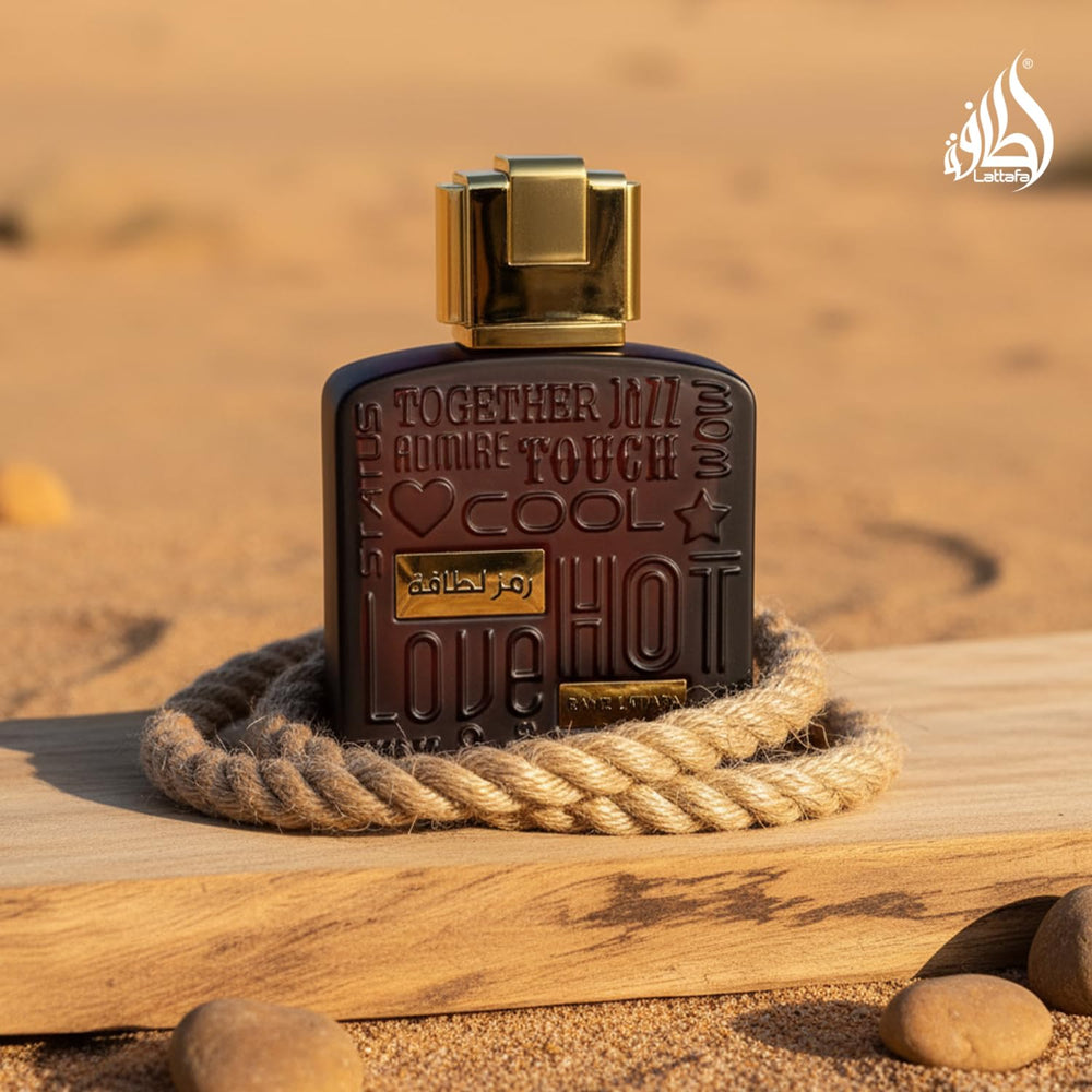 Lattafa Ramz Gold bottle in ambient light, warm glow.