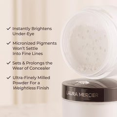 Laura Mercier powder brush application under-eye, soft light-diffusing finish