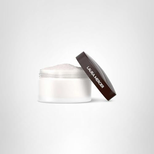Laura Mercier powder swatch shows translucent finish blending with tones