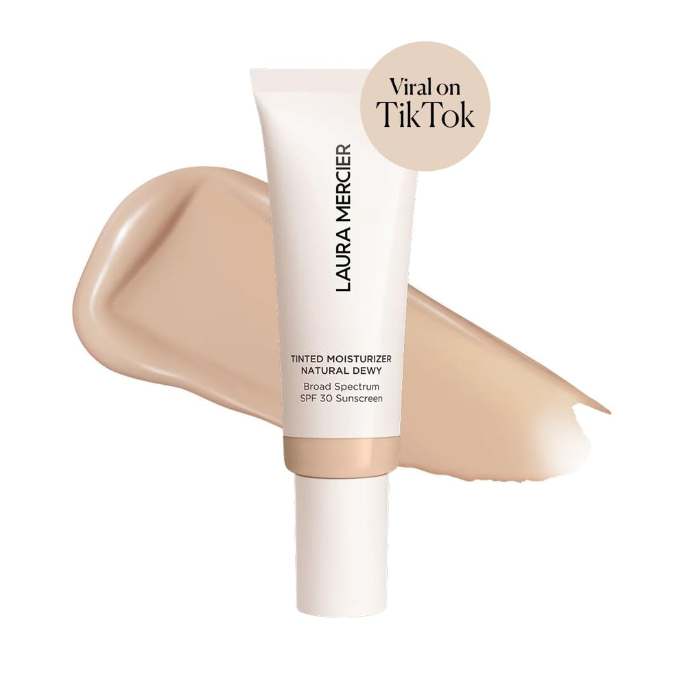Laura Mercier swatch on skin showing sheer to light coverage and hydration