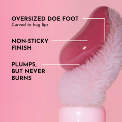Lawless Forget The Filler lip plumper gloss wand applying plush, comfortable gloss texture.