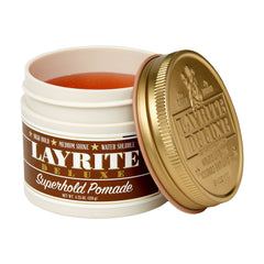 Layrite Superhold Pomade orange hair styling in action for thick or curly hair