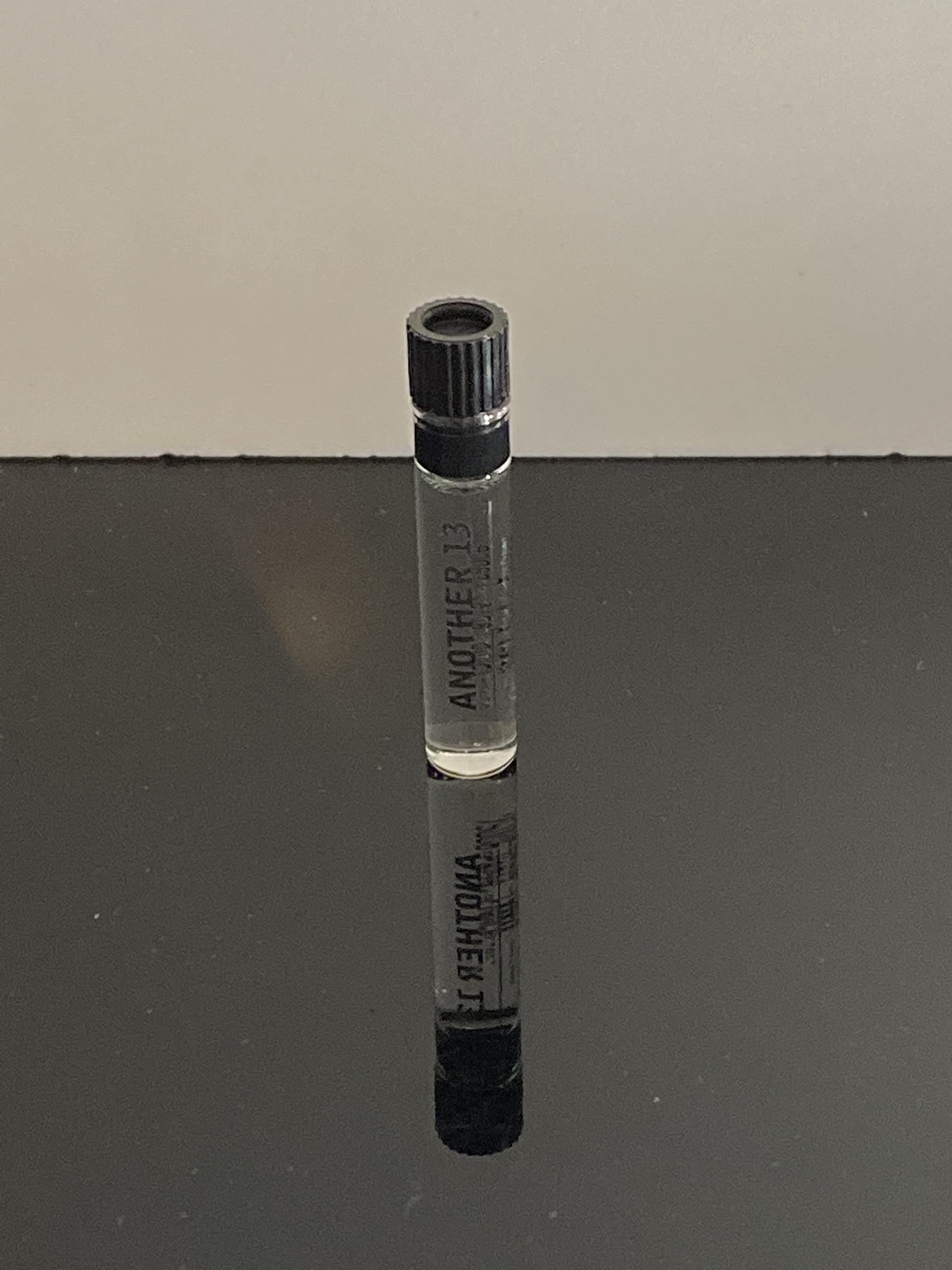 Le Labo Another 13 glass vial highlights subtle notes and a clean, precise dispensing.