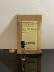 Le Labo Another 13 packaging card adds luxe branding and easy sample presentation.