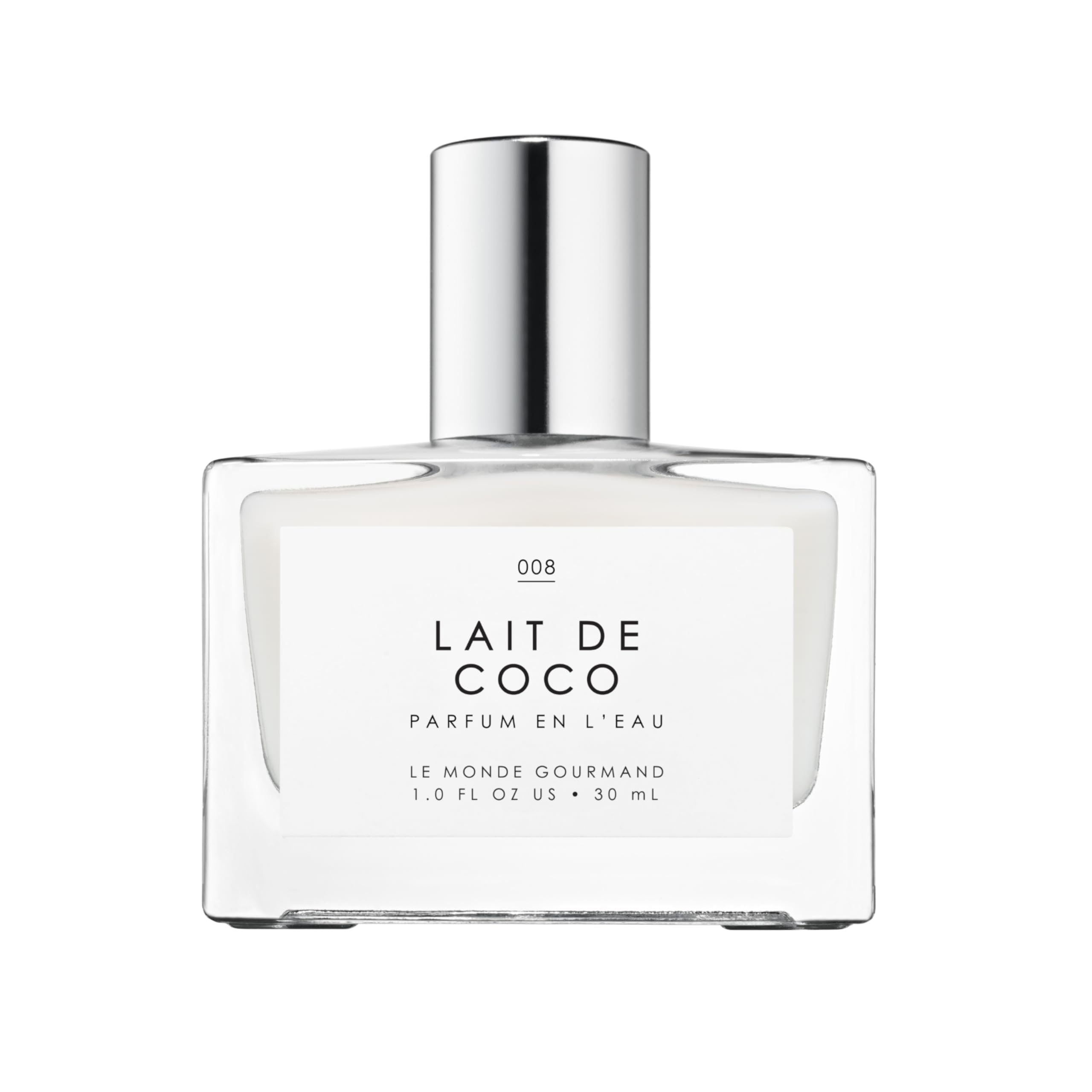 Le Monde Gourmand Lait de Coco spray bottle on a neutral surface showing tropical aroma.