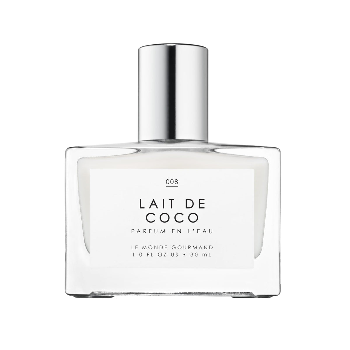 Le Monde Gourmand Lait de Coco spray bottle on a neutral surface showing tropical aroma.