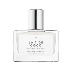 Le Monde Gourmand Lait de Coco spray bottle on a neutral surface showing tropical aroma.